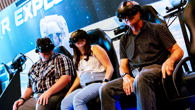 Guests enjoy virtual reality on our VR Explorer motion simulator