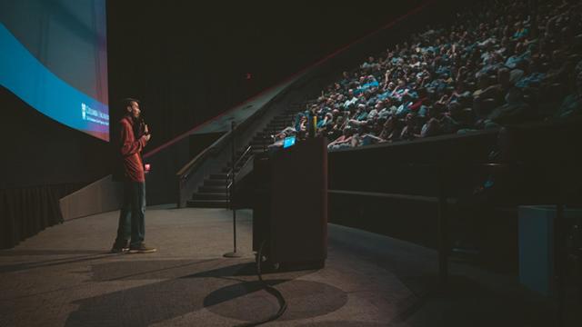 Ben speaking to a crowd