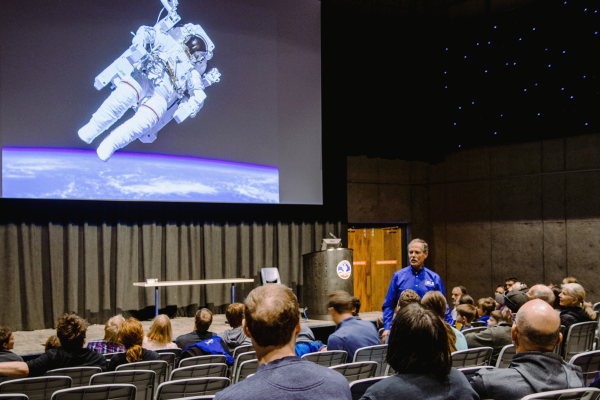 Astronaut Hoot Gibson speaks to a crowd at the U.S. Space & Rocket Center
