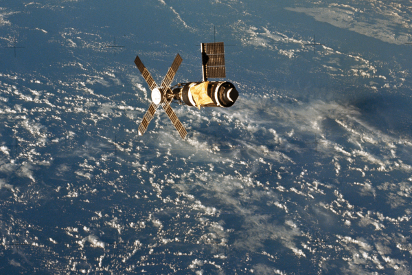 Here, the Skylab Orbital Workshop is seen as the crew departs and performs the final fly-around inspection.