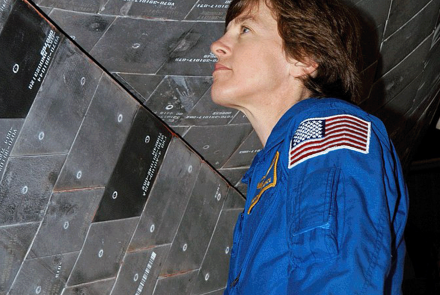 Lawrence inspects tiles that are part of the Space Shuttle's Thermal Control System. Credit: NASA